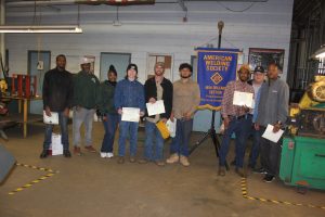 Delgado Community College Student Welders, Instructors, and Bruce Hallila (Section Chairman-Far Right in Back) 